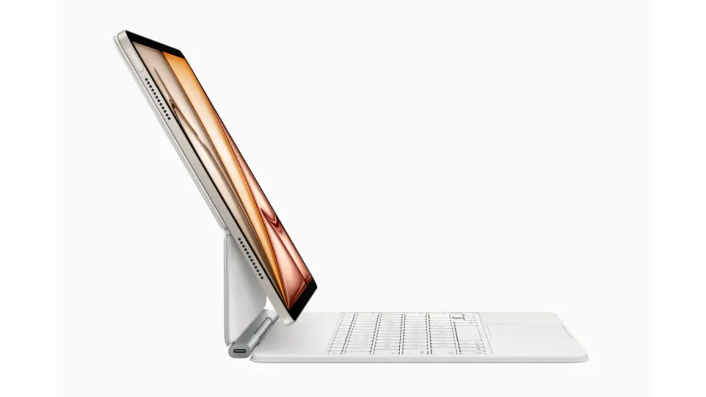 Apple iPad Air 13 (2025) side view connected to Magic Keyboard, highlighting its productivity setup.